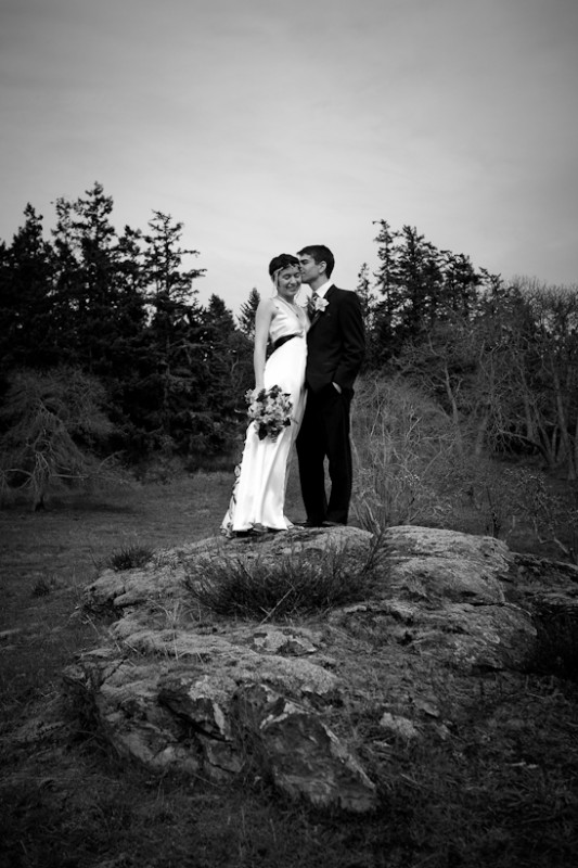 Photo of bride and groom on hill on Orcas Island